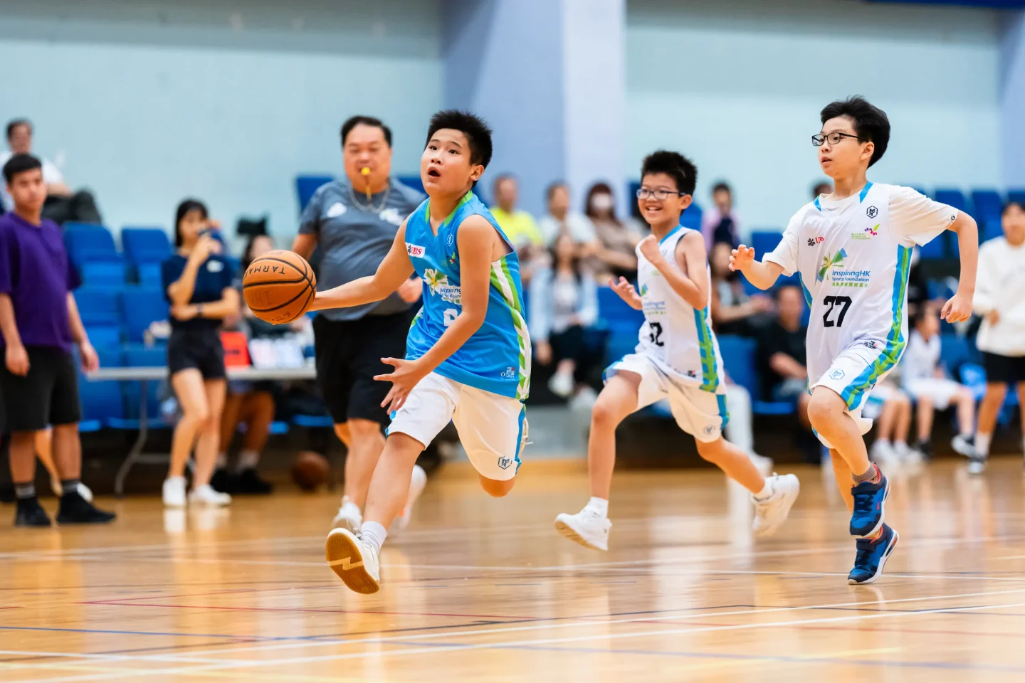 Boys playing basketball