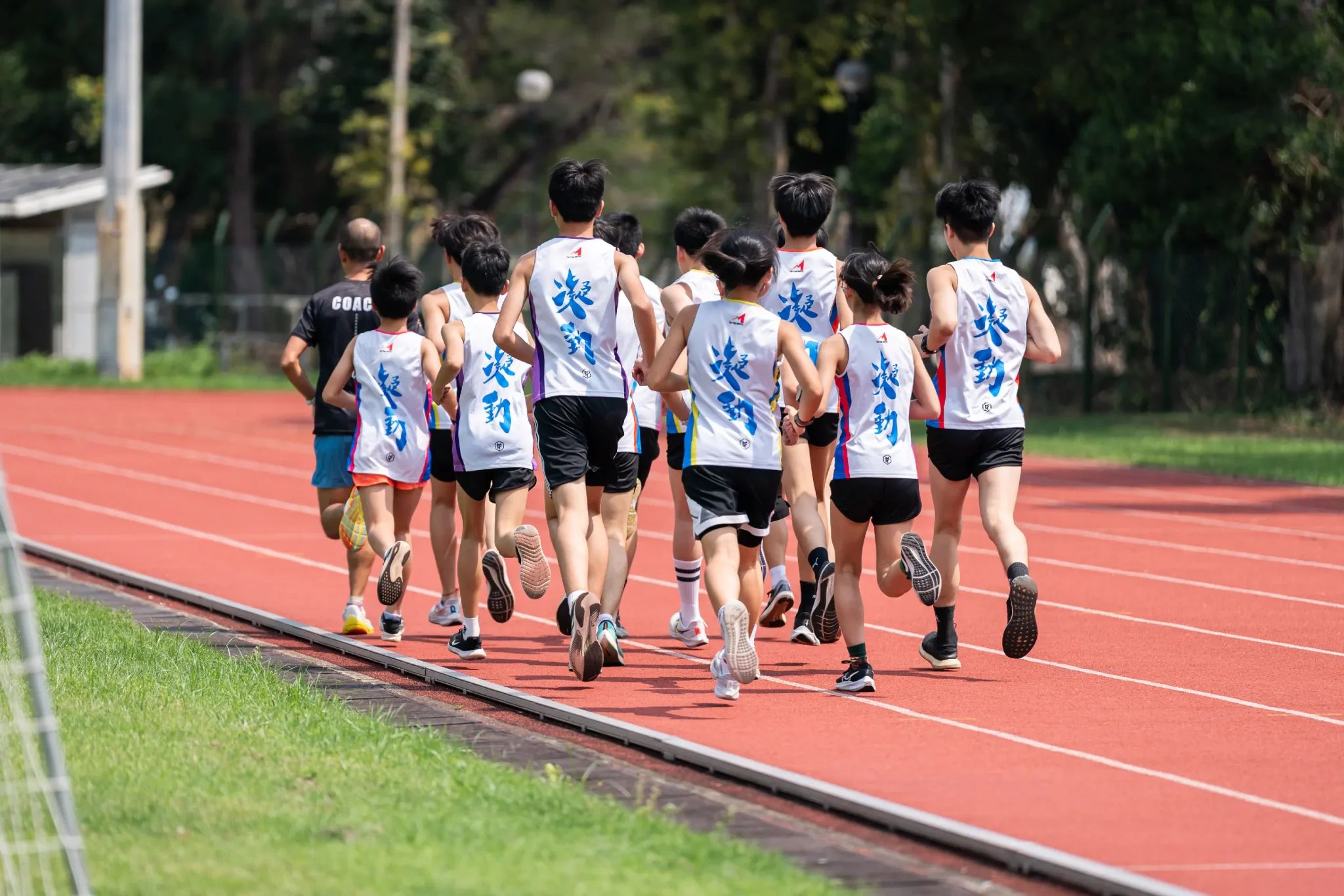 Students running on the track